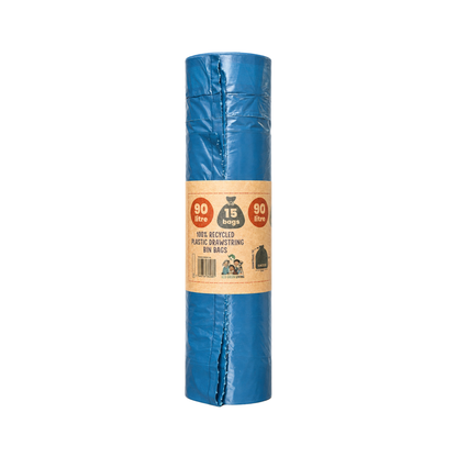 A rolled-up blue plastic recycling bin bag with a tan paper label around the middle, shown on a plain white background.